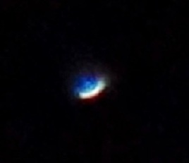 This is the first Orion pod again, with its distinctive 'message' of blue, white and red light, September 28, 2015.