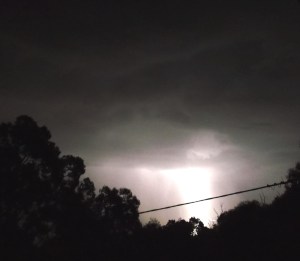 Photo take Feb.2, 2015, crescent/bow-shaped ship just above the light column, slightly to the left.