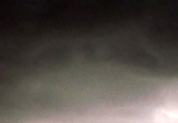 Close-up of crescent/bow-shaped ship, with disc in centre.