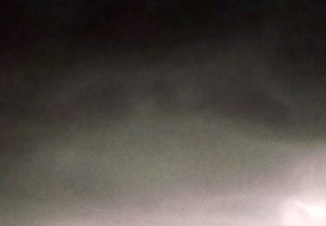 Close-up of crescent/bow-shaped ship, with disc in centre.