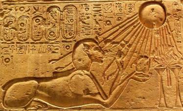 Akhenaten, Pharaoh of Ra, depicted in leonine sphinx form, receiving the 'touch of Ra's hands'.